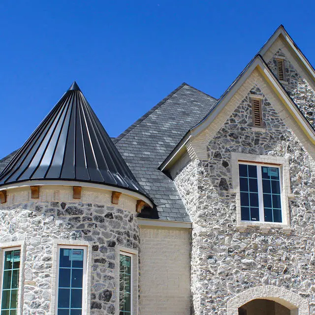 Completed custom home with a residential roof, Clover Roofing project